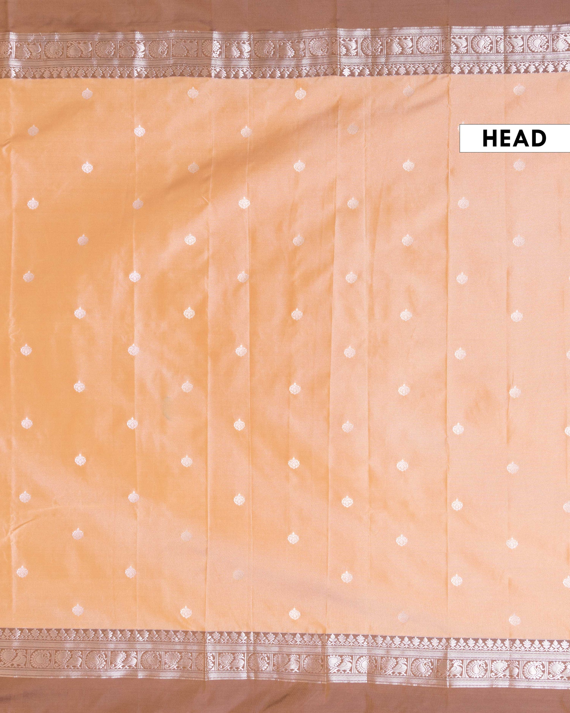 
Elegant Soft Silk Saree with Delicate Zari Buttas and Peacock Motif Contrast Border  - Peach
