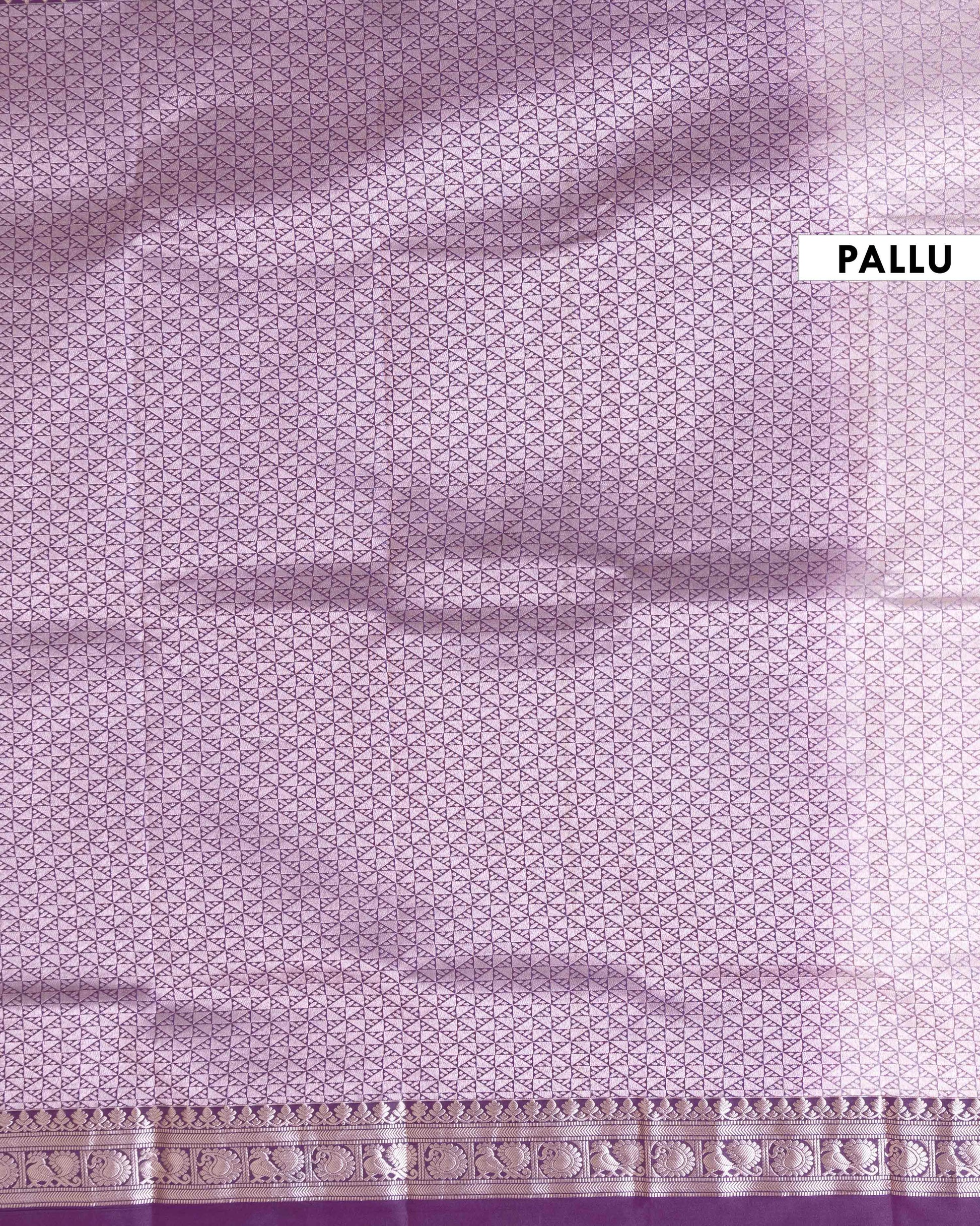 
Elegant Soft Silk Saree with Delicate Zari Buttas and Peacock Motif Contrast Border  - Peach
