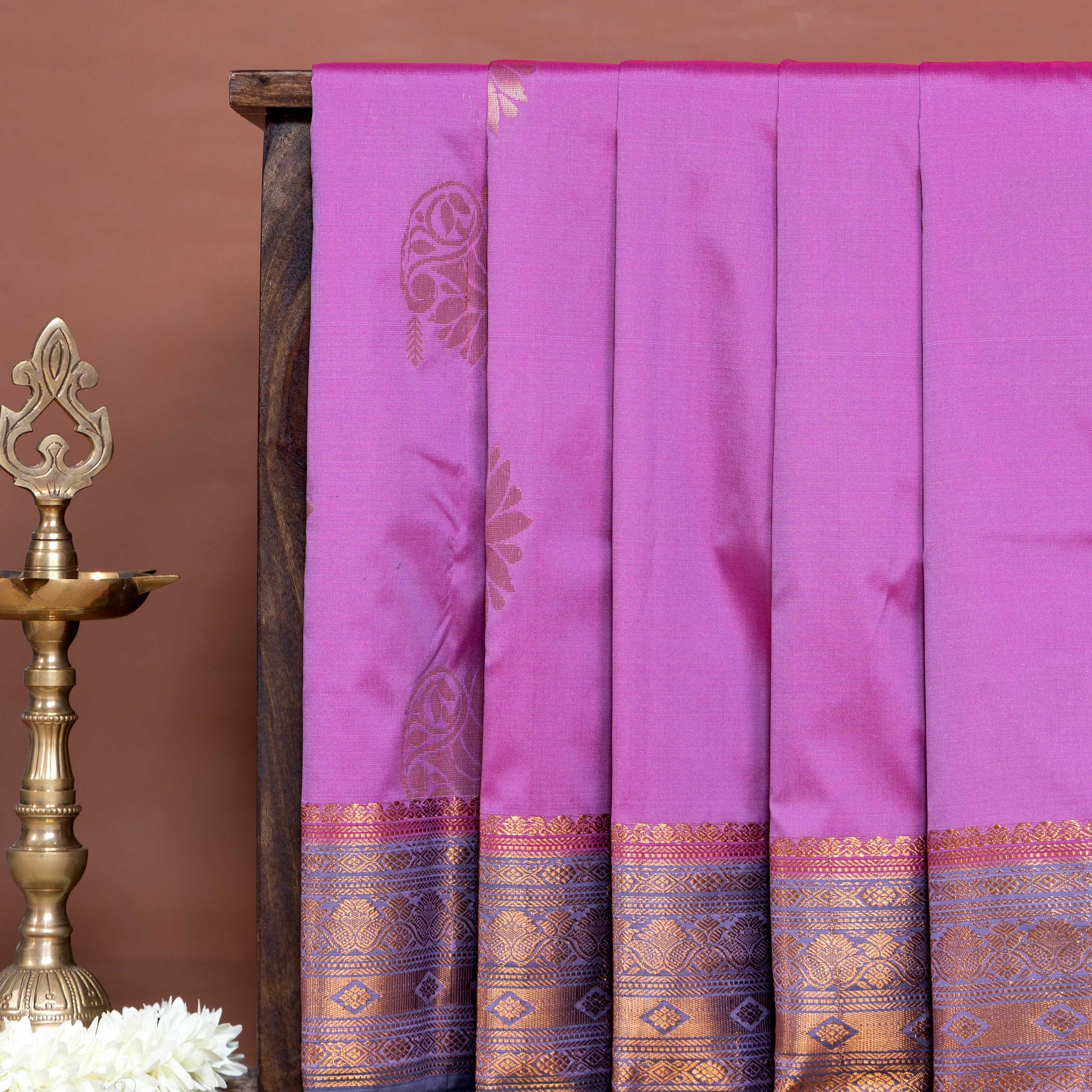 Elegant Soft Silk Saree with Paisley Butta Detailing and Traditional Zari Border - Light Purple