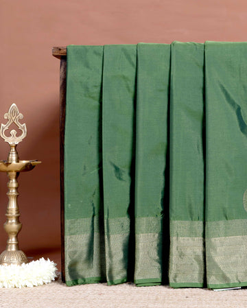 Elegant Soft Silk Saree with Subtle Zari Border and Smooth Glossy Finish - Green