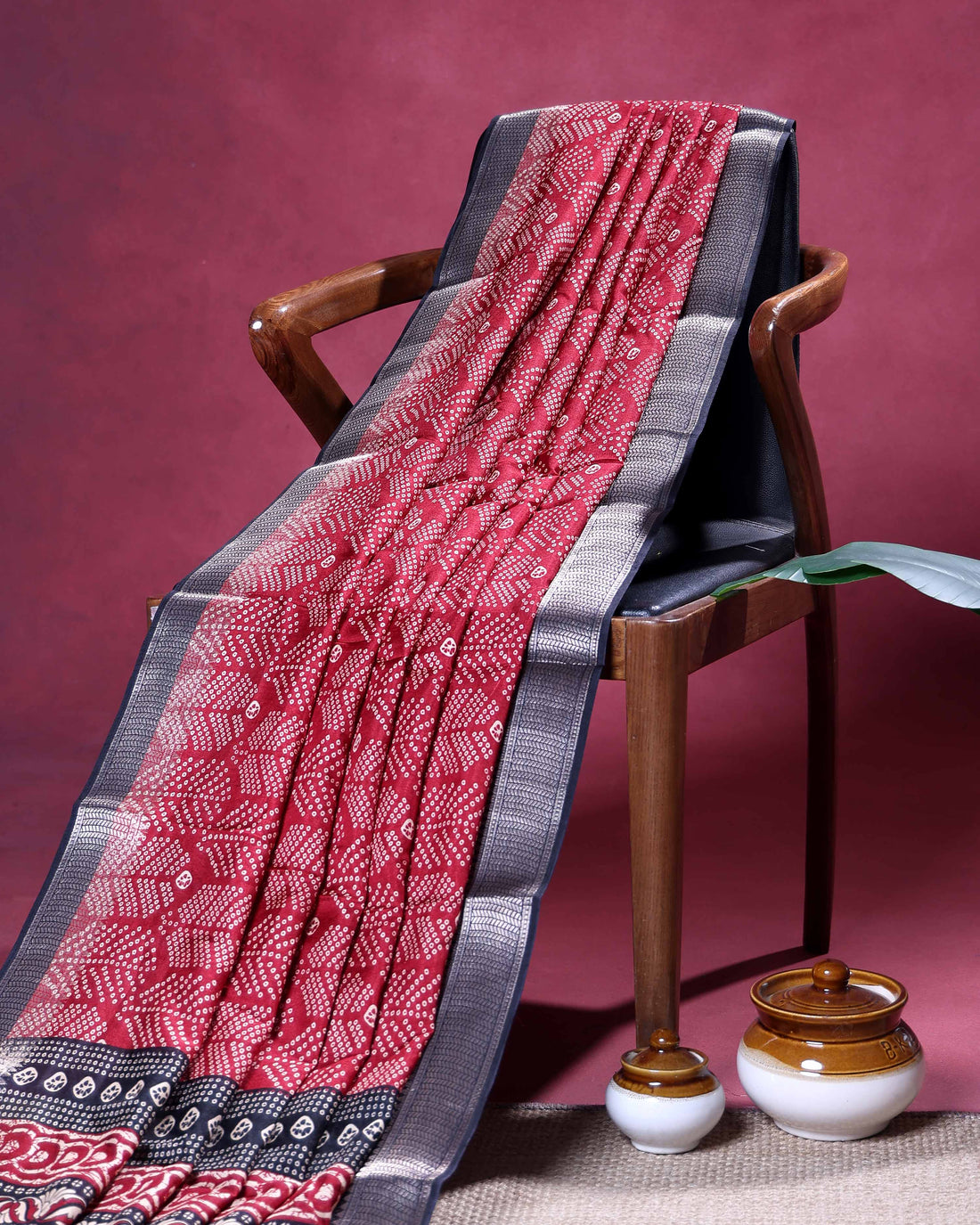 Elegant Traditional Dola Silk Saree with Intricate Leaf Motif and Subtle Geometric Border - Red