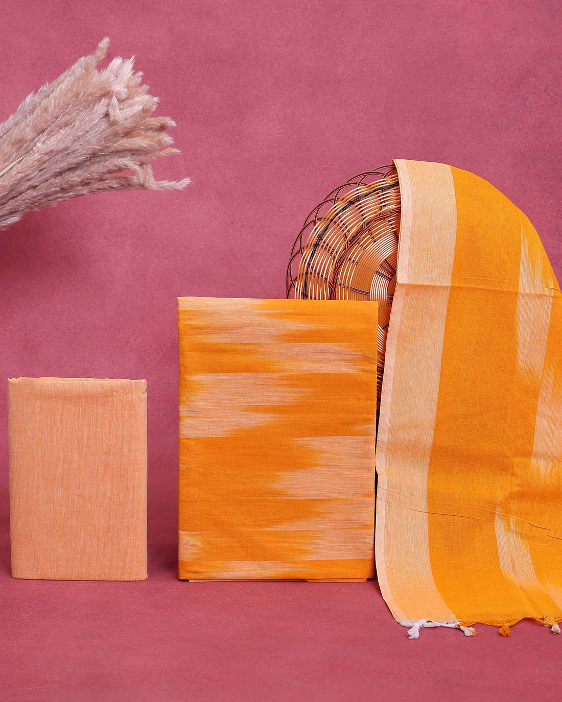 Elegant Women’s Salwar Suit Material Set Top 2.5 Mtr, Pant 2 Mtr & Dupatta 2.25 Mtr with Ikkat Inspired Pattern - Orange