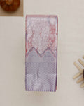 Exquisite Kanchipuram Tissue Saree with Intricate Weave and Traditional Motifs  - Peach
