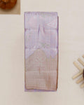 Exquisite Kanchipuram Tissue Saree with Intricate Zari Weave & Traditional Border - Lavender