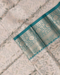 Exquisite Kanchipuram Tissue Saree with Intricate Zari Weave and Traditional Motifs - Cream-Close Up