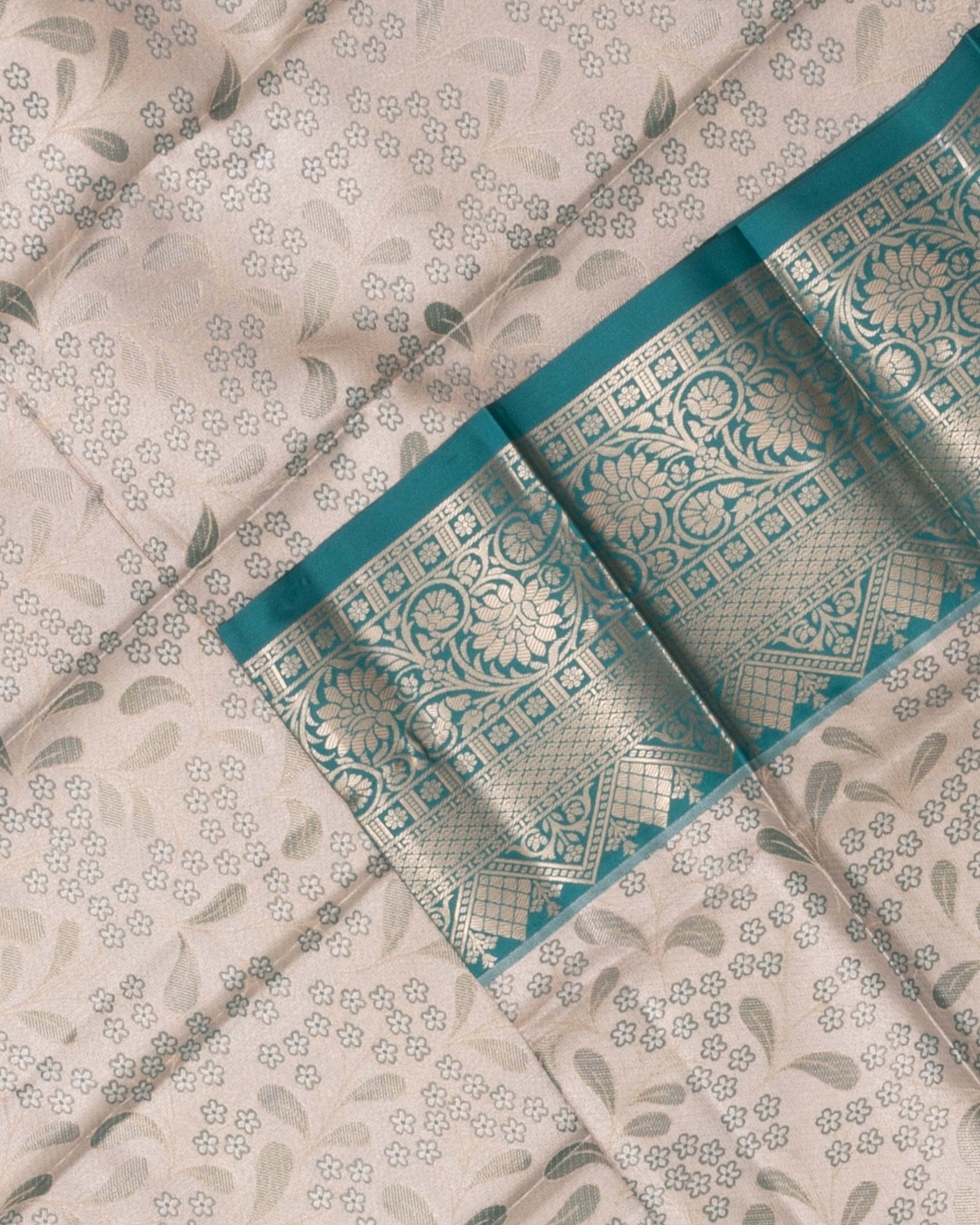 Exquisite Kanchipuram Tissue Saree with Intricate Zari Weave and Traditional Motifs - Cream-Close Up