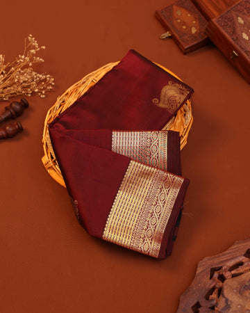 Exquisite Niranjana Silk Saree with Intricate Zari Weave and Peacock Motif - Maroon