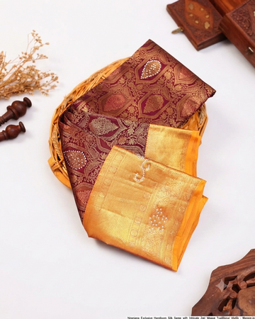 Niranjana Exclusive Handloom Silk Saree with Intricate Zari Weave & Traditional Motifs - Maroon