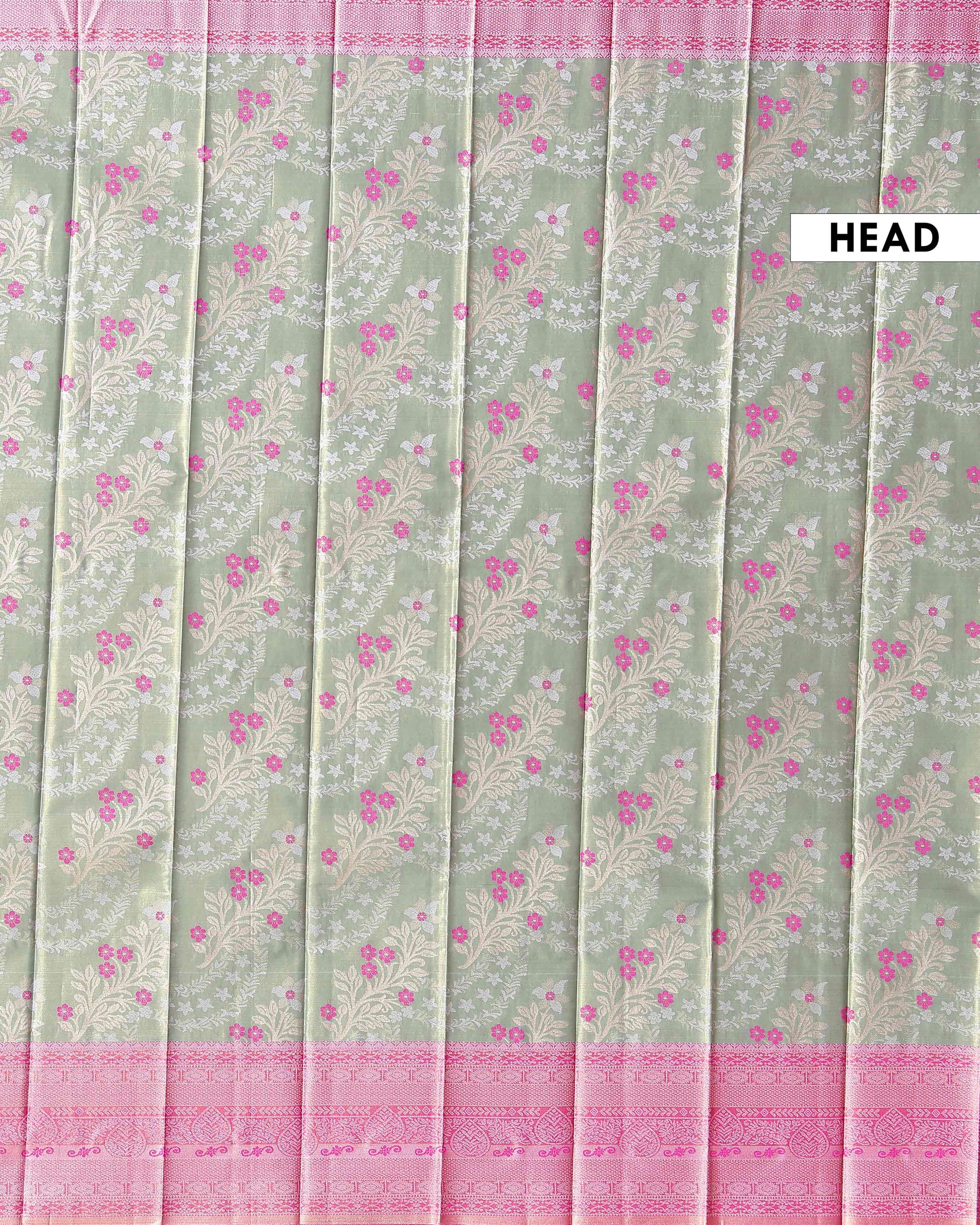 Graceful Niranjana Silk Saree Adorned with Small Floral Motifs and Traditional Zari Border - Green