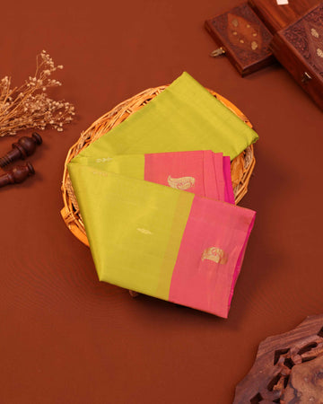 Graceful Traditional Silk Saree with Minimal Zari Buttas Elegant Contrast Border and Subtle Paisley Pallu Design - Green