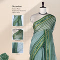 Green Bengal Cotton Saree Featuring Woven Stripes, Butta Motifs And Contrast Pallu Draped Front View