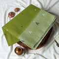 Green Bengal Cotton Saree With Contrast White Striped Border And Woven Motifs Close Up Draped View