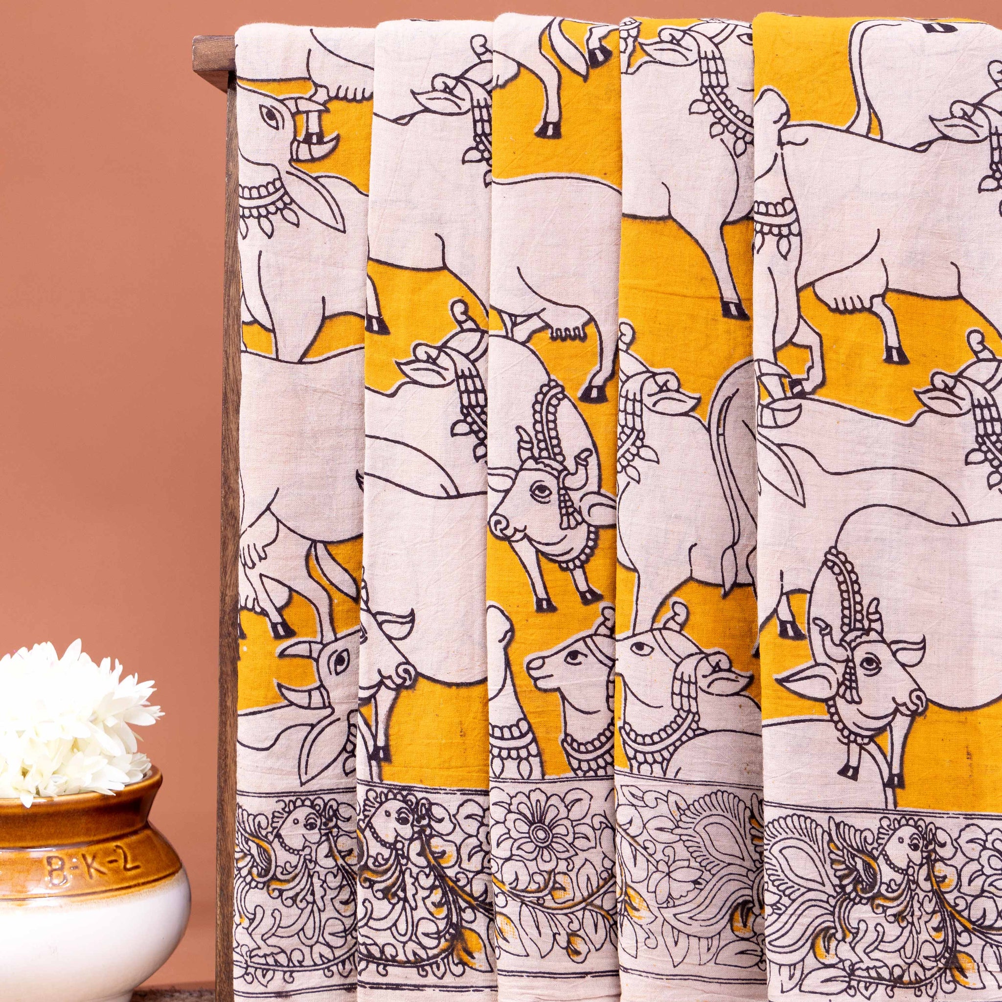 Handcrafted Kalamkari Saree with Cow and Intricate Border Patterns - Yellow