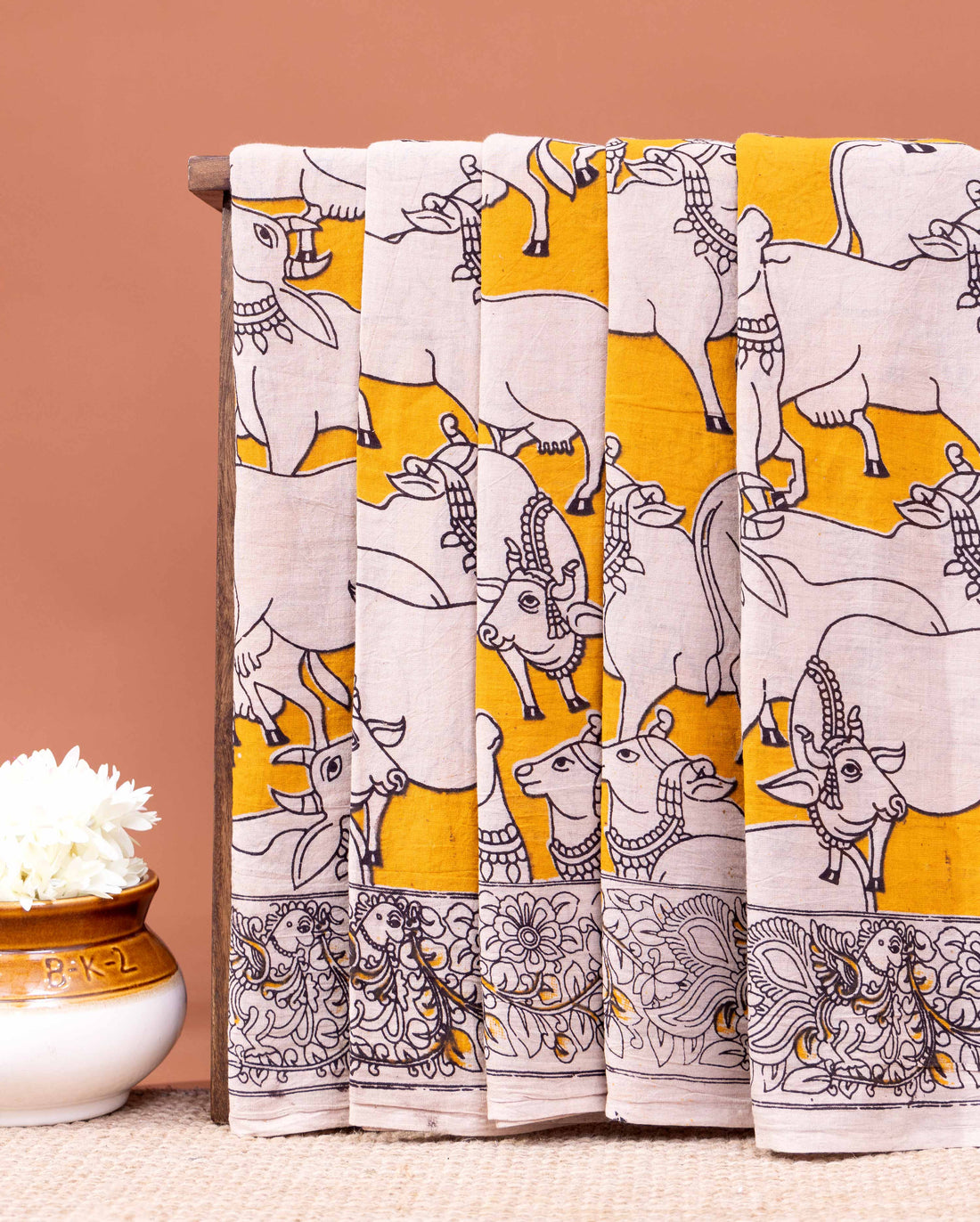 Handcrafted Kalamkari Saree with Cow and Intricate Border Patterns - Yellow