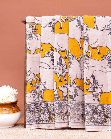 Handcrafted Kalamkari Saree with Cow and Intricate Border Patterns - Yellow