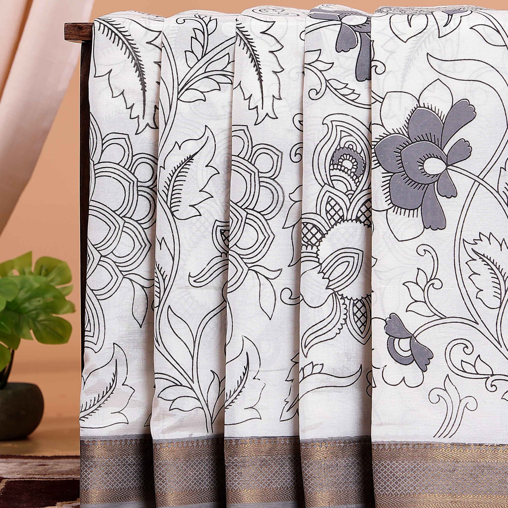Handcrafted Mangalagiri Semi Chanderi Saree with Kalamkari-Inspired Floral Motifs and a Contrast Zari Border  - White