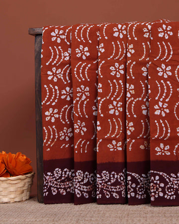 Handcrafted Sungudi Cotton Saree with Intricate Wax Batik Design and Contrast Border - Brown