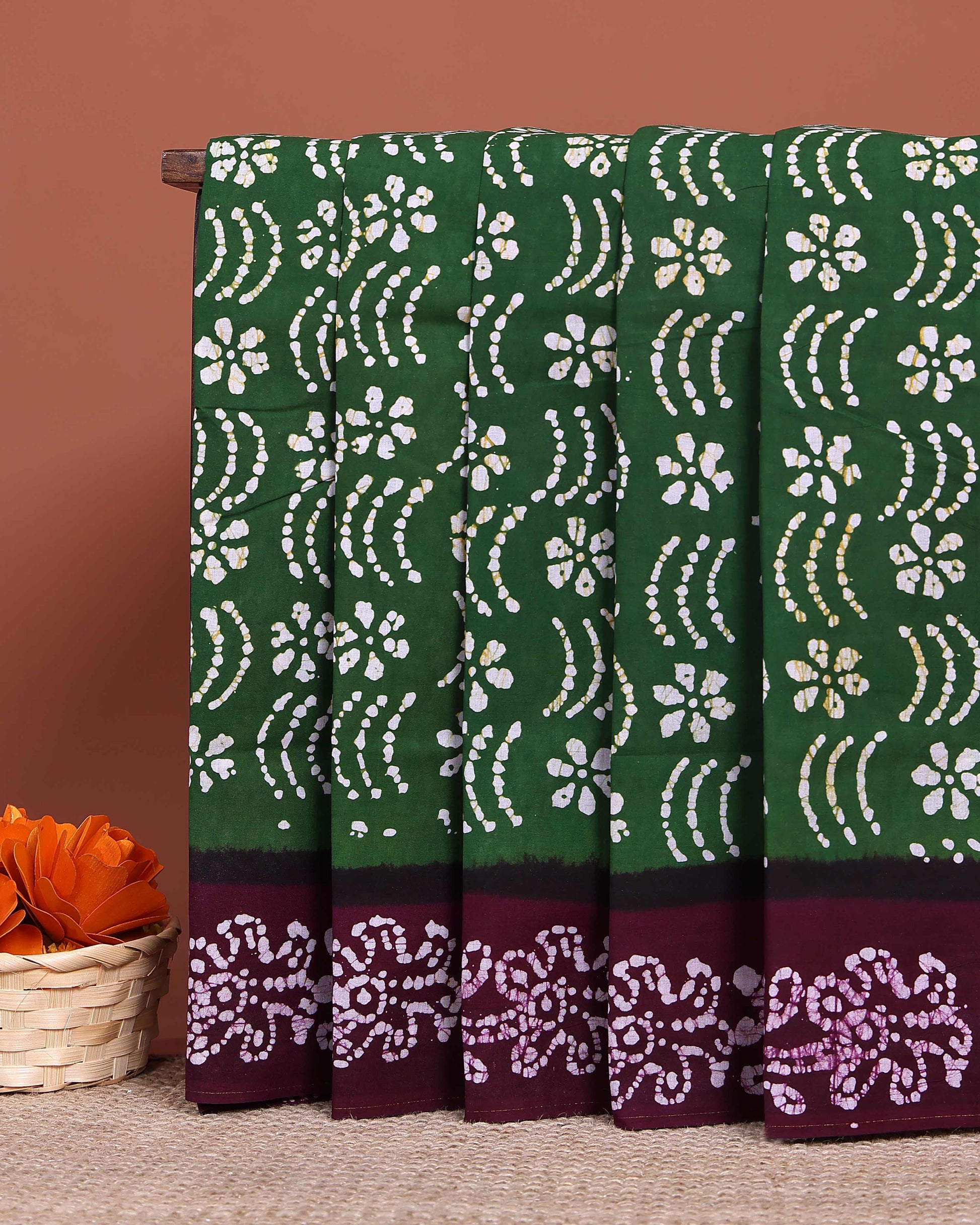 Handcrafted Sungudi Cotton Saree with Intricate Wax Batik Design and Contrast Border - Dark Green