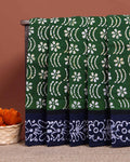 Handcrafted Sungudi Cotton Saree with Intricate Wax Batik Design and Contrast Border - Green