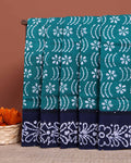 Handcrafted Sungudi Cotton Saree with Intricate Wax Batik Design and Contrast Border - Teal
