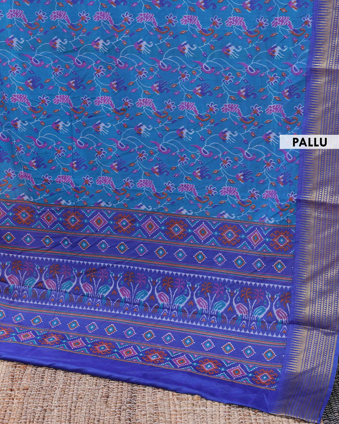 Handloom Semi Patola Silk Saree with Ikkat and Peacock Motif Border - Blue