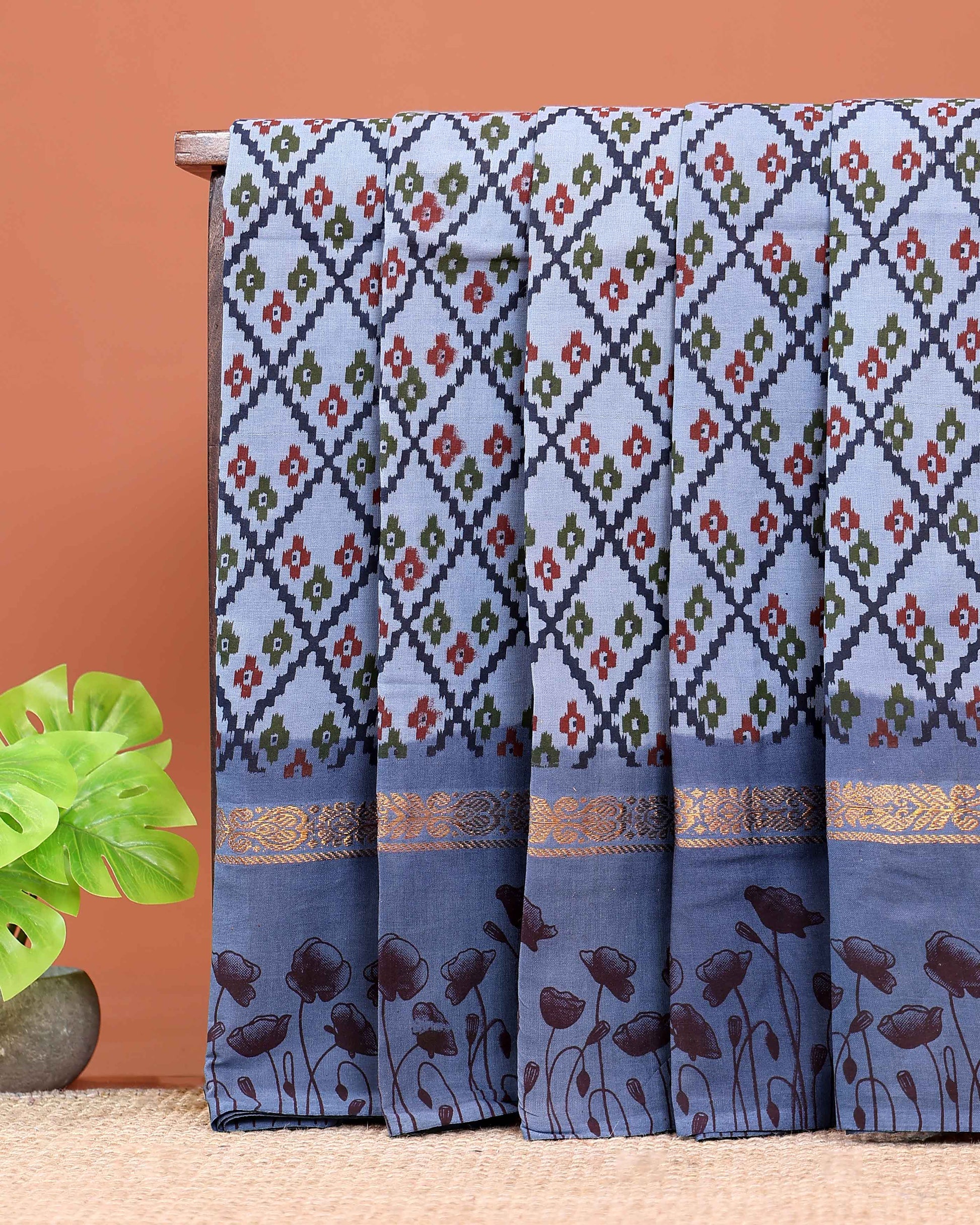 Handloom Sungudi Cotton Saree with Geometric Diamond Pattern & Floral Border - Light Blue