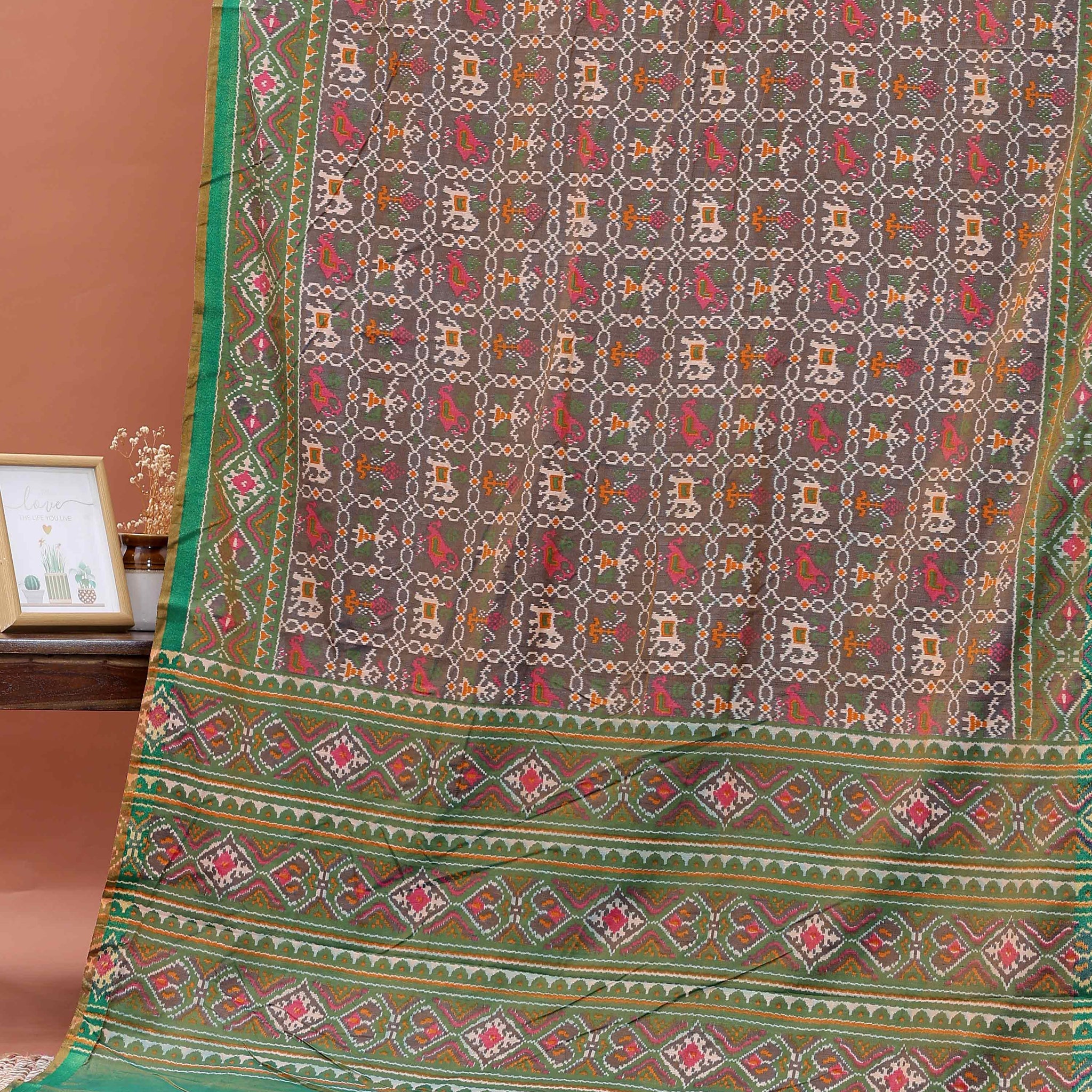 Handwoven Patola Silk Saree with Intricate Ikat Weave and Traditional Geometric Motifs - Brown