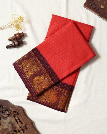 Coral Red Checked Sungudi Cotton Saree with Wine Maroon Contrast and Antique Gold Zari Woven Peacock Border