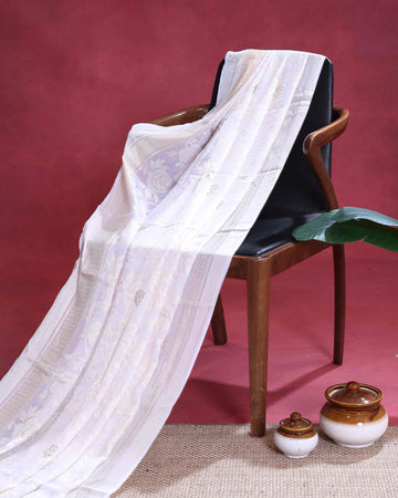 Elegant Dola Saree with Intricate Floral Motifs and Zari Border – Cream