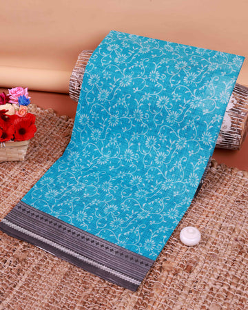 All-Over Floral Printed Voile Saree with Intricate Contrast Border – Blue