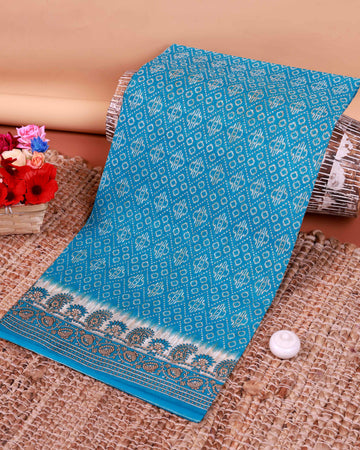 All-Over Floral Printed Voile Saree with Intricate Contrast Border – Blue