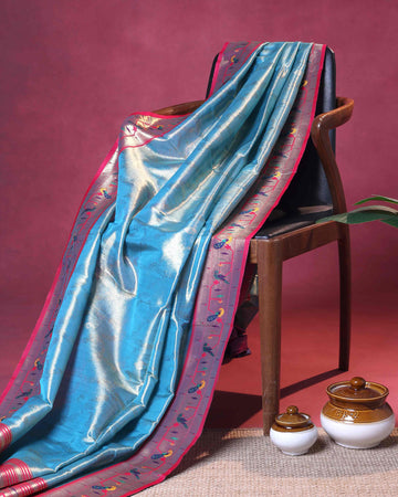 Elegant Paithani Tissue Saree with Traditional Peacock Motif Border and Rich Zari Weave - Sky Blue