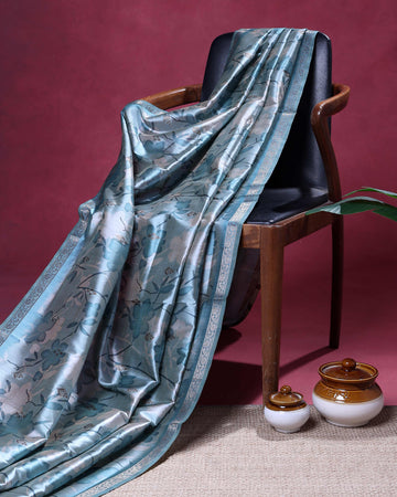 Elegant Floral Printed Semi Silk Saree With a Subtle Sheen and a Zari Woven Border - Blue