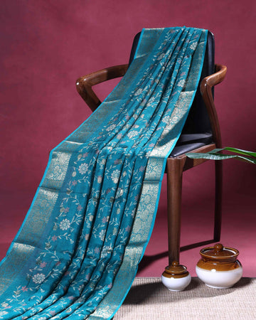 Elegant Dola Silk Saree with Subtle All Over Floral Print and a Graceful Zari Border  - Blue