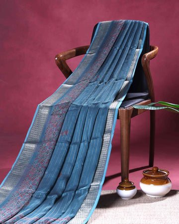 Elegant Dola Silk Saree with Vertical Stripes Intricate Floral Butta Motifs and Traditional Zari Woven Border - Teal