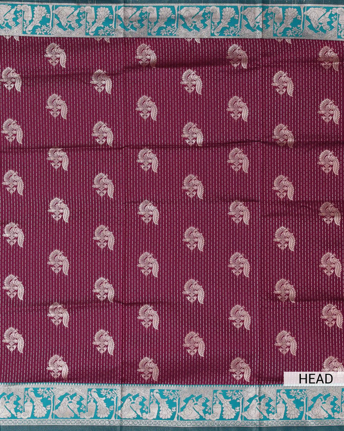 Litchi Silk Saree for Women with Traditional Peacock Motifs Intricate Woven Stripes Detailed Zari Border and Tasselled Pallu - Wine