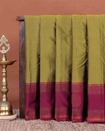 Elegant Semi Soft Silk Saree with Plain Body and Contrast Zari Woven Border - Olive Green