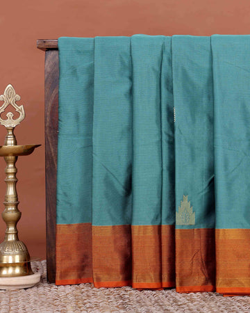 Elegant Semi Soft Silk Saree with Plain Body and Contrast Zari Woven Border - Teal