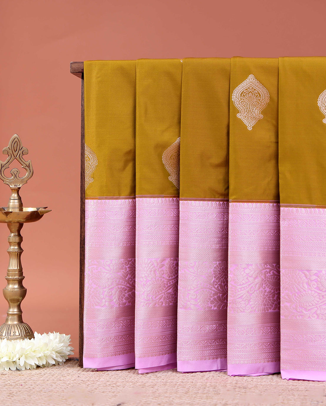 Elegant Niranjana Silk Saree Adorned with Refined Butta Design and Ornate Zari Border - Olive Green