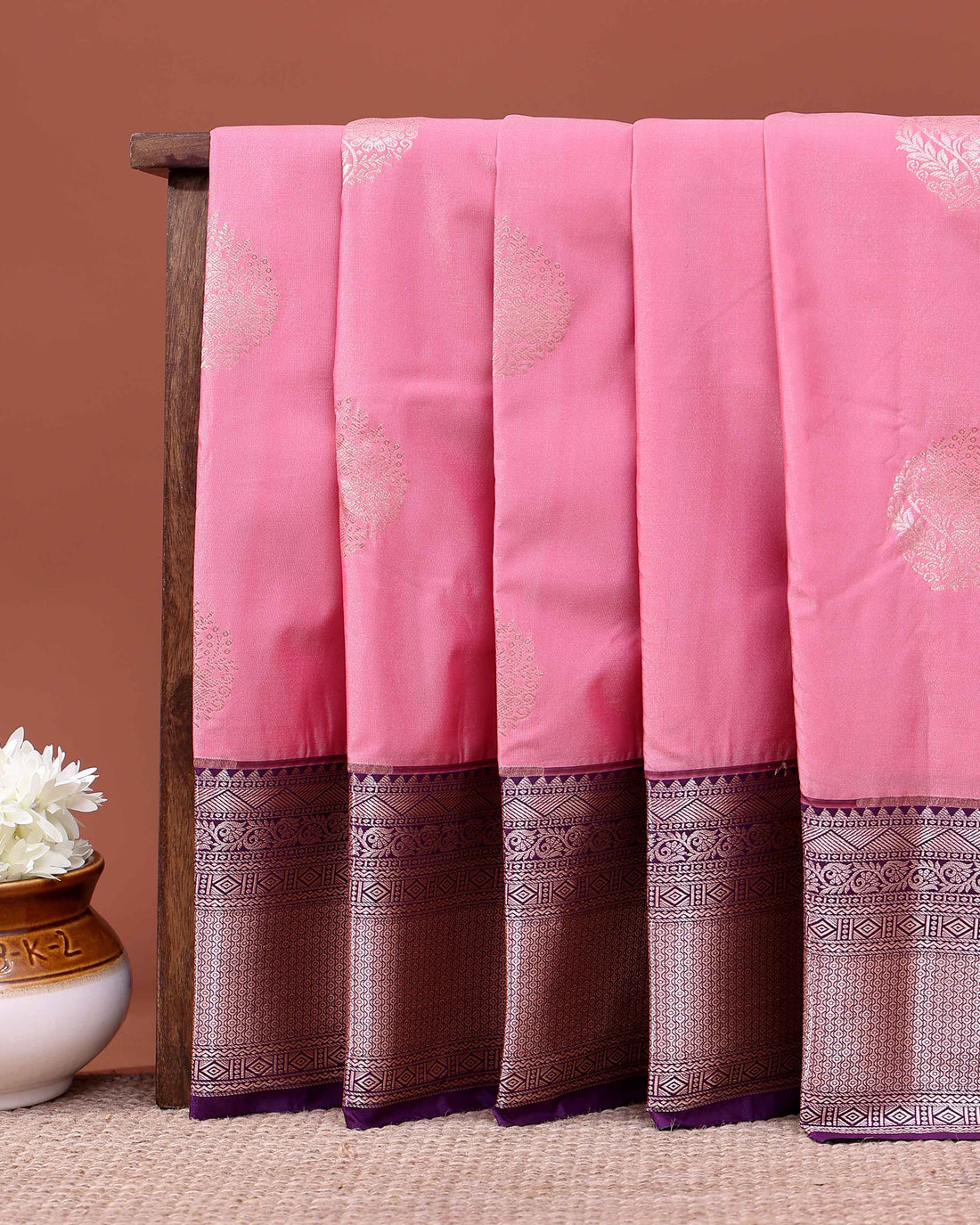 Traditional Niranjana Silk Saree Adorned with Woven Zari Motifs and a Contrasting Border - Pink