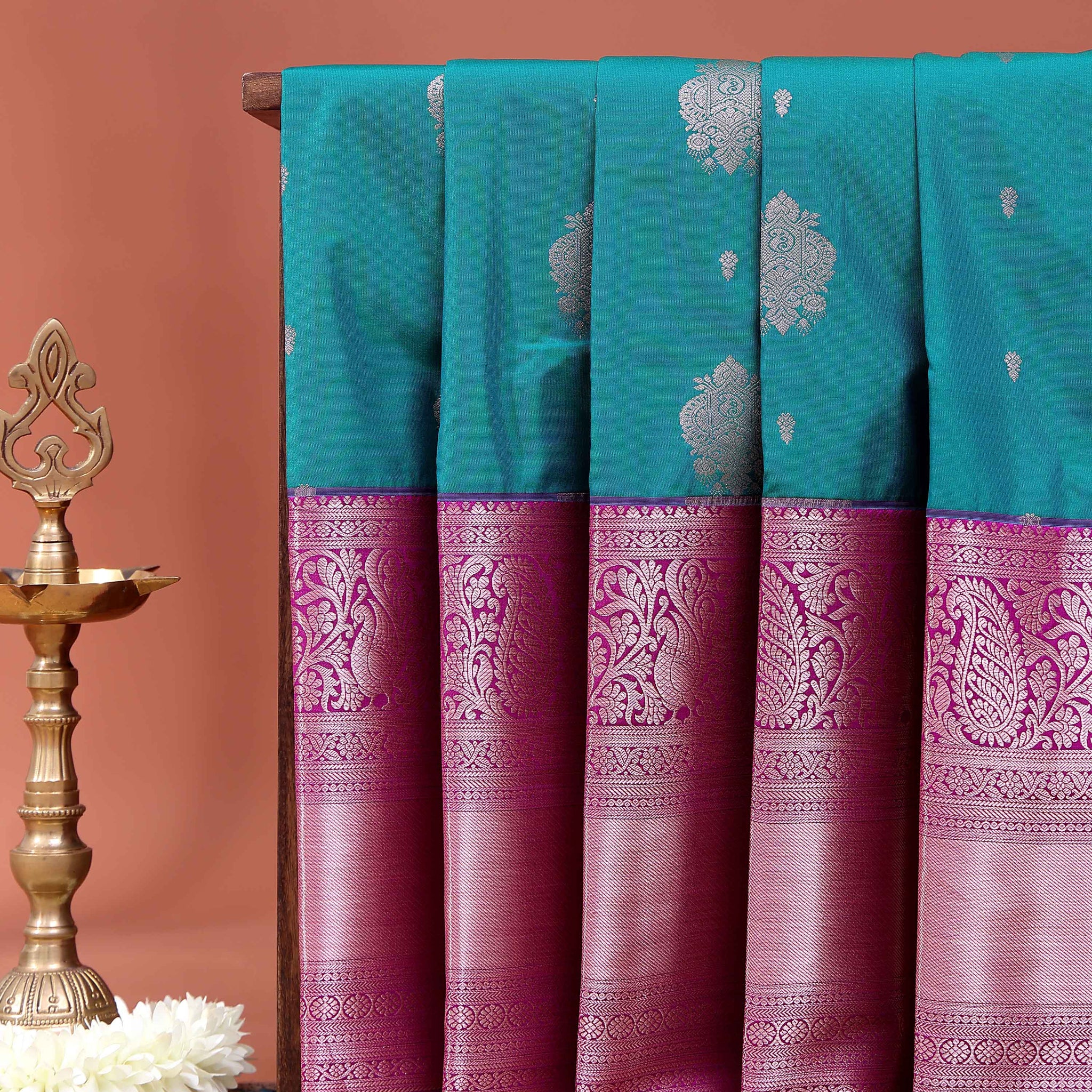 Niranjana Silk Saree with Intricate Floral Brocade Weaving and Rich Contrast Border - Teal