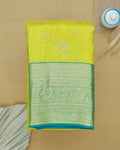 Niranjana Silk Saree with Intricate Zari Weave and Embellished Motifs - Green