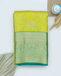 Niranjana Silk Saree with Intricate Zari Weave and Embellished Motifs - Green