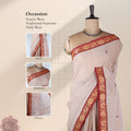 Kanchi Cotton Saree With Red Zari Border And Woven Motifs In Beige Draped On Mannequin Front View
