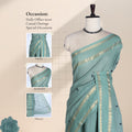 Chettinad cotton saree with elegant zari border and checked body with woven butta motifs light green front draped view