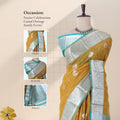 Yellow Elampillai silk cotton saree with silver zari floral border, zari buttas and vertical stripes front view