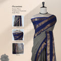 Kanchi Cotton Saree With Navy Blue Zari Border On Grey Fabric Front View On Mannequin With Traditional Drape
