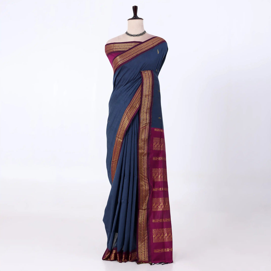 Kalyani Cotton saree with plain deep blue body and maroon zari woven border, front drape view