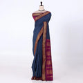 Kalyani Cotton saree with plain deep blue body and maroon zari woven border, front drape view