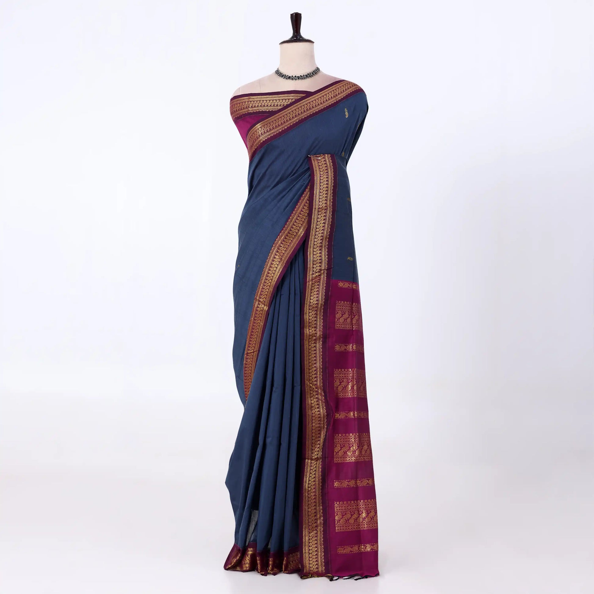 Kalyani Cotton saree with plain deep blue body and maroon zari woven border, front drape view